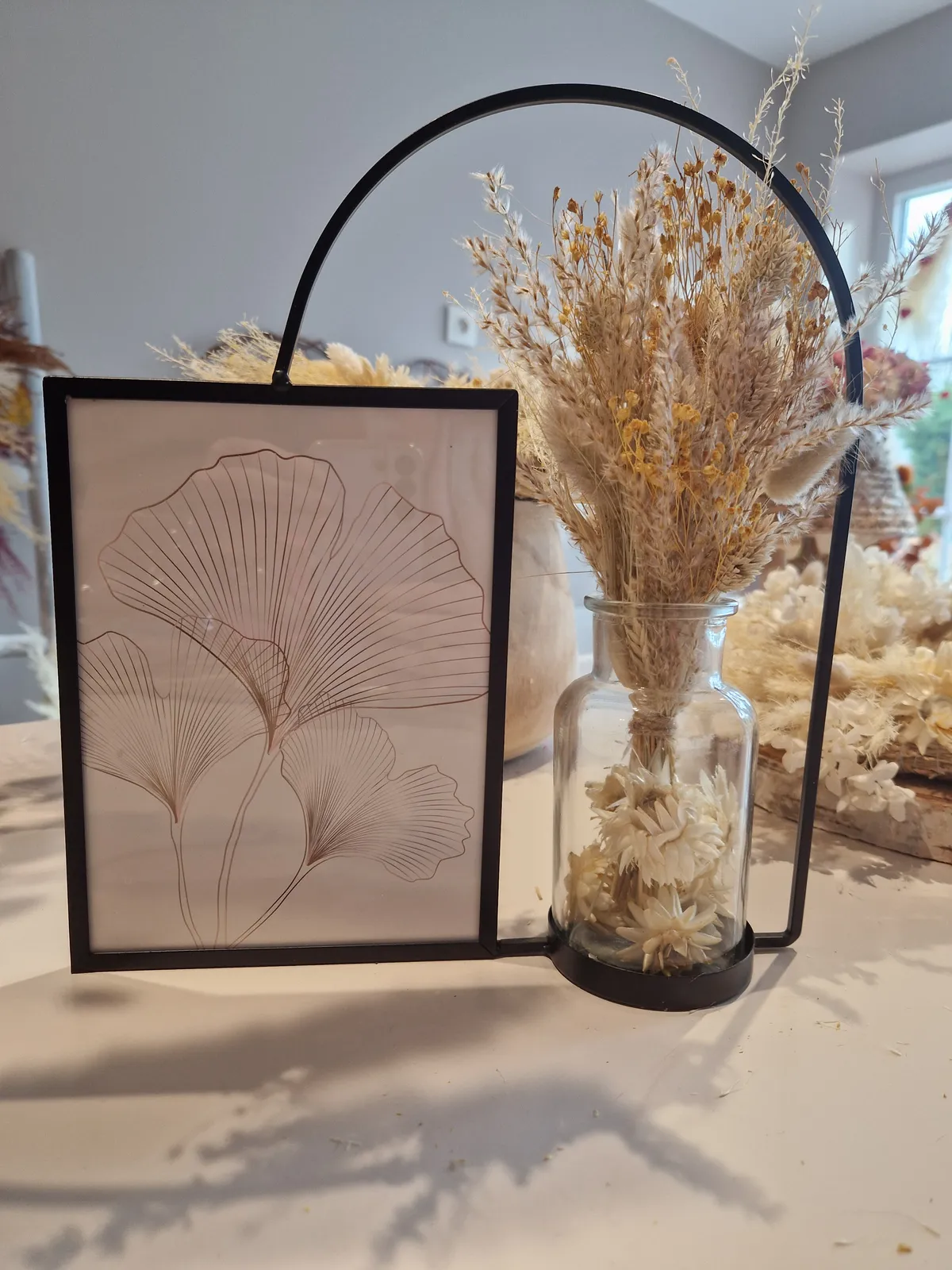 Composition de fleurs séchées en lanterne