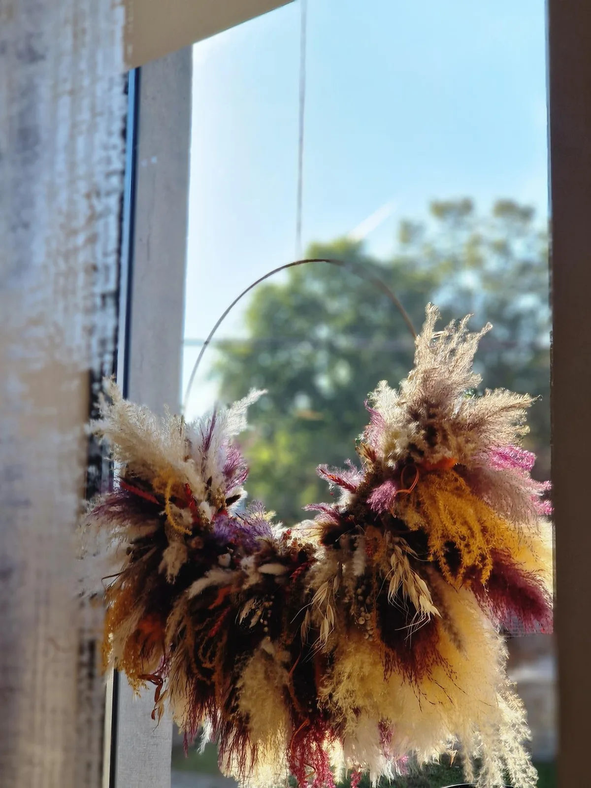 Couronne automnale vitrine commerce